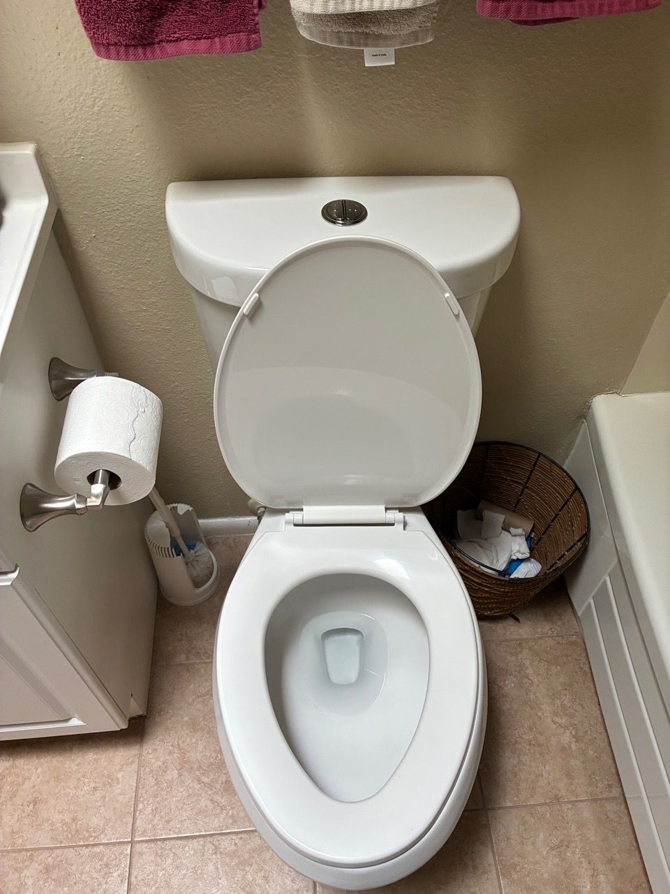 Detail shot of a clean toilet bowl after a recurring residential clean