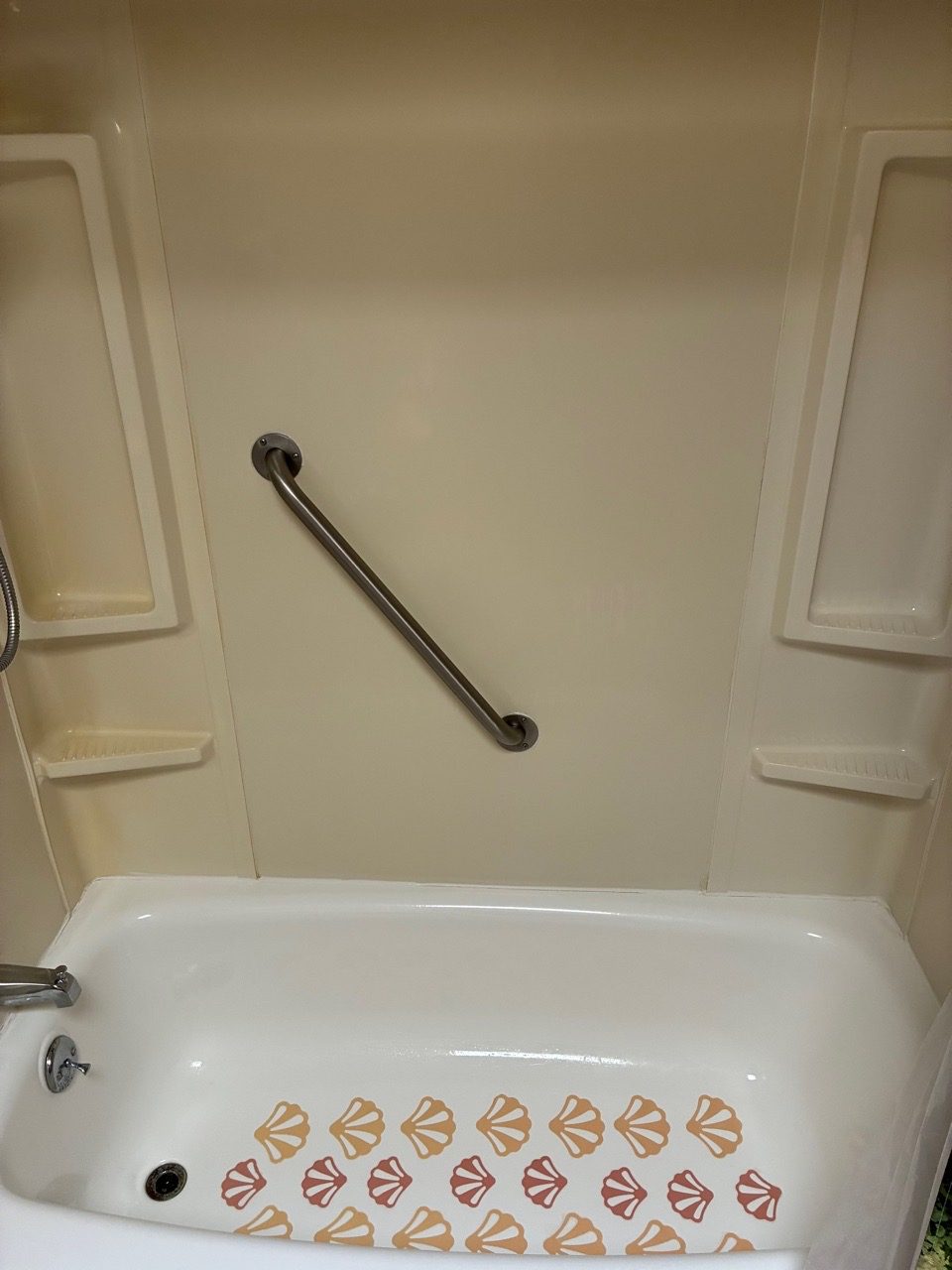 Clean alcove tub after a recurring residential cleaning visit